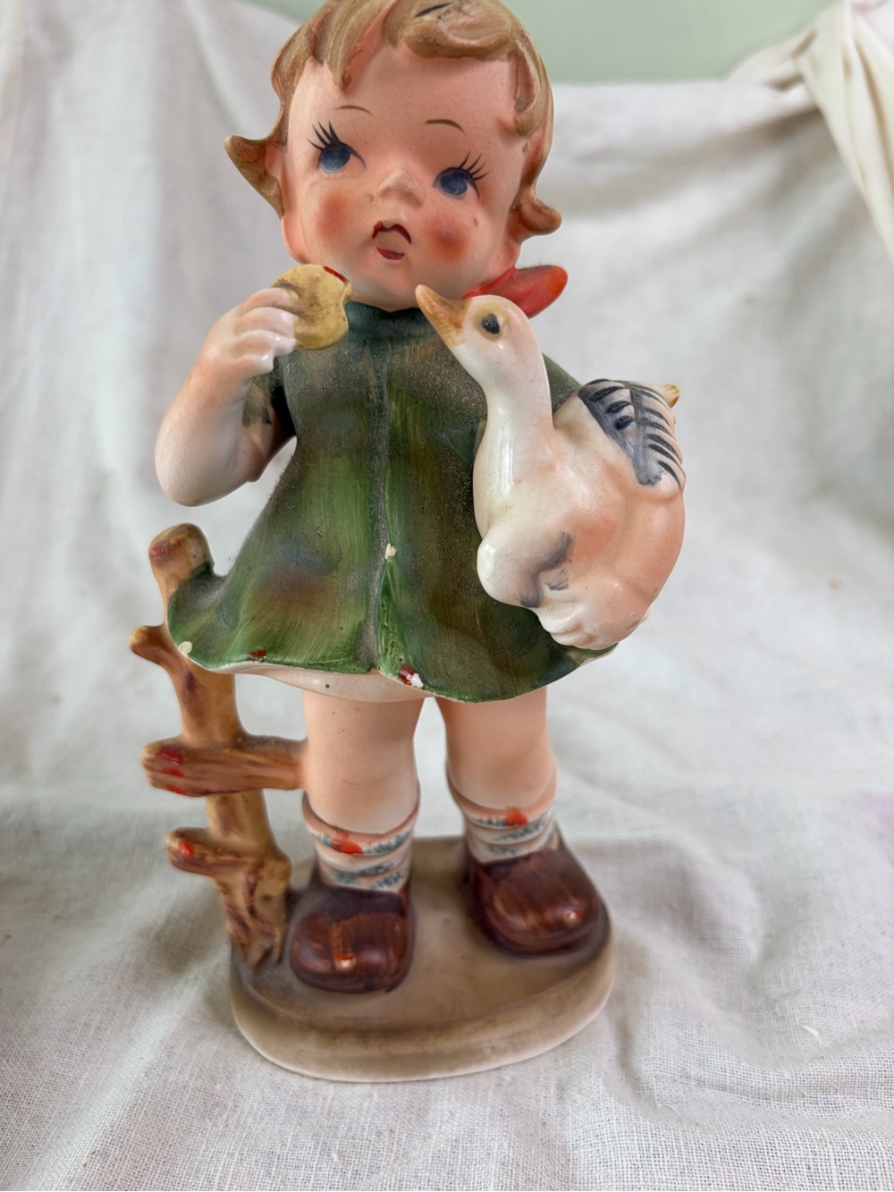 Vintage Ceramic Girl Figurine in Green Dress with Goose